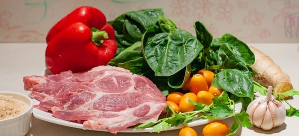 What's the Best Way to Prepare a Flavorful and Spicy Jerk Pork with Pineapple Salsa?